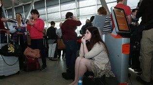 Warten am Flughafen Sydney: Nach dem Zusammenbruch eines Computersystems kam es zu Verzögerungen bei der Passkontrolle. (Archivbild)