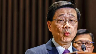 Absoluter Peking-Loyalist: Hongkongs Regierungschef John Lee verkündet am Dienstag stolz die Verschärfung des Sicherheitsgesetzes.