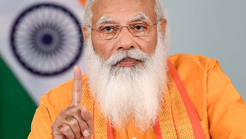 ARCHIV - Der indische Premierminister Narendra Modi hält anlässlich des Internationalen Yogatages eine Rede per Videokonferenz. Modi wird am 17. September 71 Jahre alt und seine hindunationalistische Partei veranstaltet für ihn drei Wochen lang…