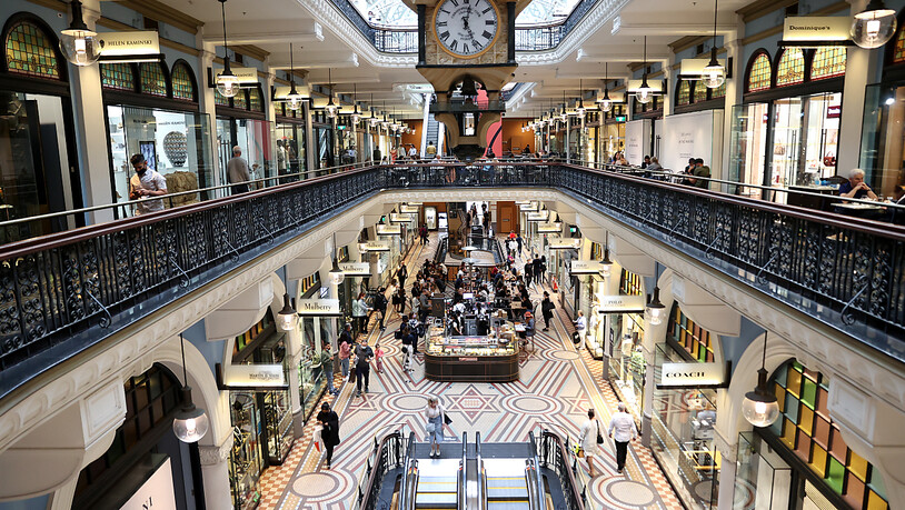 People shop and dine at cafes inside the Queen Victoria Building in Sydney, Saturday, October 16, 2021. After 106 days, almost 63,000 cases and nearly 440 deaths, stay-at-home orders were lifted and a raft of restrictions eased across NSW on Monday. (AAP…