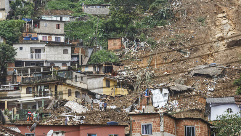 Häuser in Rio de Janeiro sind nach einem Erdrutschvöllig zerstört. Foto: Erica Martin/TheNEWS2 via ZUMA Press Wire/dpa