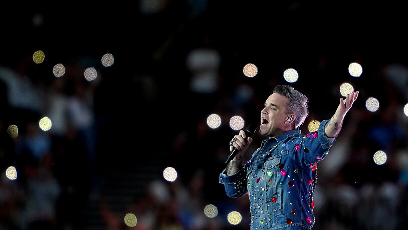 Robbie Williams hat eine Tournee zum 25. Jubiläum seiner Solo-Karriere im Oktober angekündigt. Foto: Zac Goodwin/PA Wire/dpa