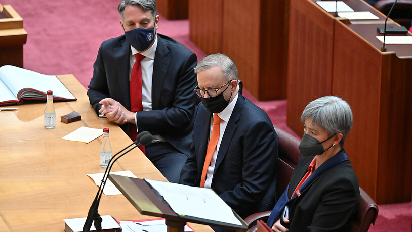 Deputy Prime Minister Richard Marles, Prime Minister Anthony Albanese and Minister for Foreign Affairs Penny Wong are seen in the Senate chamber during the opening of the 47th Federal Parliament at Parliament House in Canberra, Tuesday, July 26, 2022. …