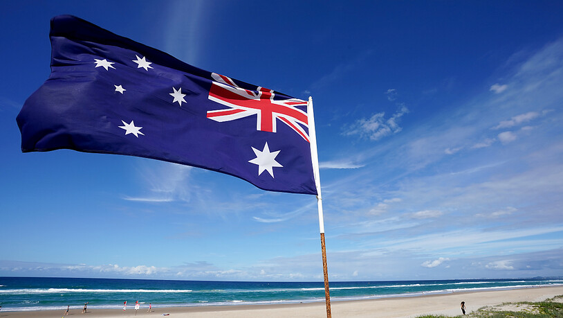 An Australian flag is seen at Main Beach on the Gold Coast, Tuesday, April 7, 2020. Australian Prime Minister Scott Morrison today urged all Australians to stay home over the Easter weekend amid the countrys coronavirus restrictions. Locally, the Gold…