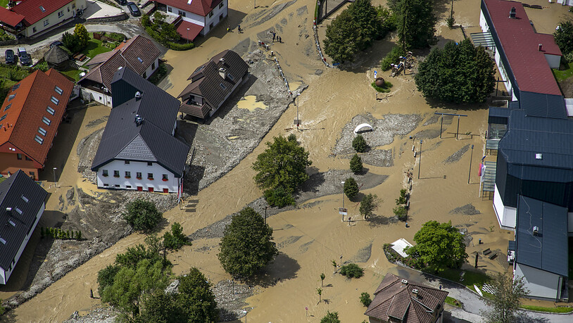 dpatopbilder - Ein überschwemmtes Gebiet ist auf einer Luftaufnahme zu sehen. Foto: -/AP/dpa
