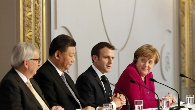 Trafen sich am Dienstag in Paris (v.l.n.r): Jean-Claude Juncker, Xi Jinping, Emmanuel Macron und Angela Merkel.