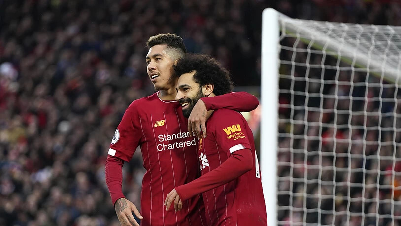 Liverpools Roberto Firmino (links) und Mohamed Salah dürfen sich über einen weiteren Meisterschaftssieg freuen