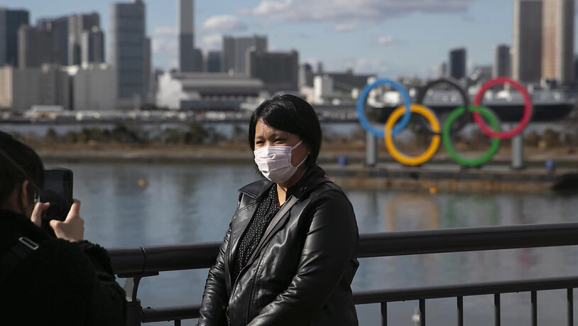 Schutzmaske und olympische Ringe: Tokio bangt um die Olympischen Spiele