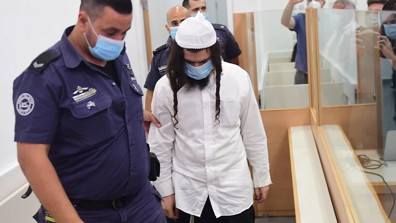 Das Bezirksgericht in Lod bei Tel Aviv verurteilte den 25-jährigen Amiram Ben-Uliel wegen Mordes in drei Fällen. Foto: Avshalom Sassoni/Maariv POOL/AP/dpa