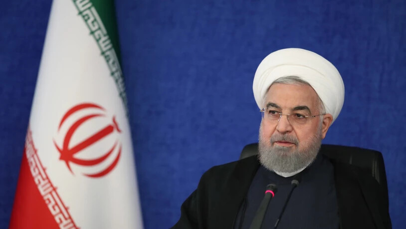 HANDOUT - Der iranische Präsident Hassan Ruhani führt den Vorsitz bei einer Sitzung des sogenannten Nationalen Hauptquartiers für den Kampf gegen das Coronavirus. Der Iran ist stark betroffen von der Corona-Pandemie. Foto: -/Iranian Presidency/dpa -…
