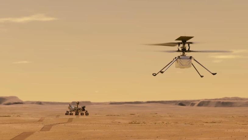 Just am 100. Jahrestag des ersten Helikopterflugs auf der Erde wird das Ereignis auf dem Mars wiederholt: Der Mini-Helikopter "Ingenuity" soll 90 Sekunden in der dünnen Mars-Atmosphäre navigieren. Links im Bild der Marsrover. (Nasa)