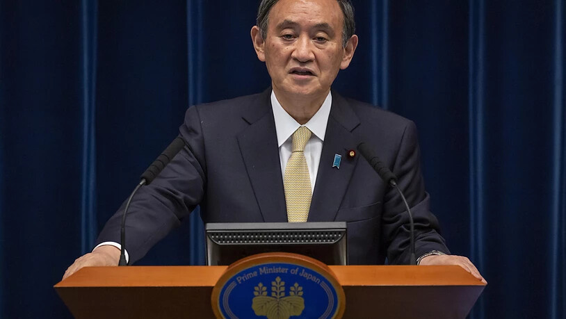 Yoshihide Suga, Premierminister von Japan, spricht während einer Pressekonferenz. Foto: Yuichi Yamazaki/Getty Images pool/AP/dpa