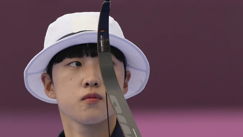 Der modische Hut tarnt bei Triple-Goldgewinnerin An San aus Südkorea den feministischen Kurzhaarschnitt, für den sie in der Heimat kritisiert worden ist