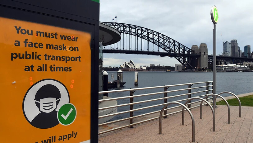 A sign warning mask wearing is seen at a ferry wharf in Sydney, Wednesday, July 28, 2021. NSW recorded 177 new locally acquired cases of COVID-19 in the 24 hours to 8pm last night. (AAP Image/Mick Tsikas) NO ARCHIVING