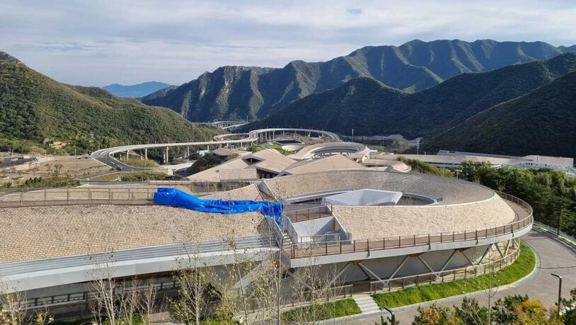 Knapp 100 Kilometer nordwestlich von Peking ist die Bobbahn in Yanqing eines der Vorzeige-Objektive der ersten Winterspiele in China
