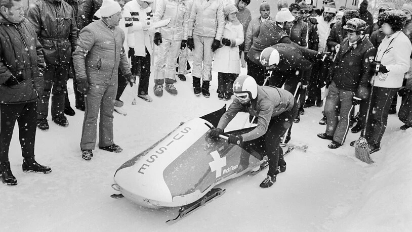 Die Schweizer Bobfahrer Jean Wicky und Bremser Edy Hubacher