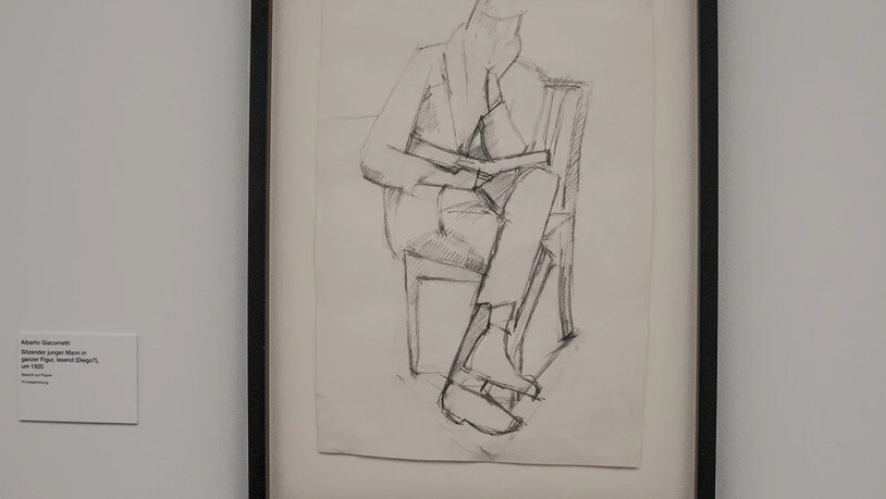 Sitzender junger Mann in ganzer Figur, lesend, um 1920, Bleistift auf Papier.
Bild zVg