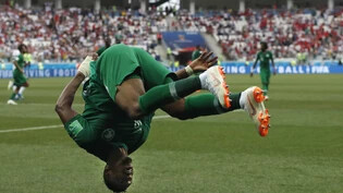 Saudi Arabia's Salem Aldawsari celebrates with a flip after scoring his side's second goal during the group A match between Saudi Arabia and Egypt at the 2018 soccer World Cup at the Volgograd Arena in Volgograd, Russia, Monday, June 25, 2018. (AP Photo…