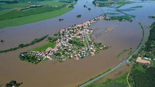 Sind Hochwasserschäden bei uns versichert?