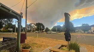 A supplied image shows smoke from a bushfire near the town of Beaufort, west of Ballarat, Victoria, Thursday, February 22, 2024. More than 1000 firefighters are working to contain a large bushfire raging in Western Victoria as hot conditions set in…