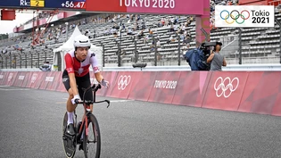 Radrennen: In Fuji sind einzelne Tribünenplätze von Fans besetzt.